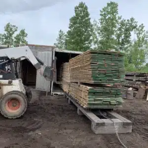Wood loading a kiln.