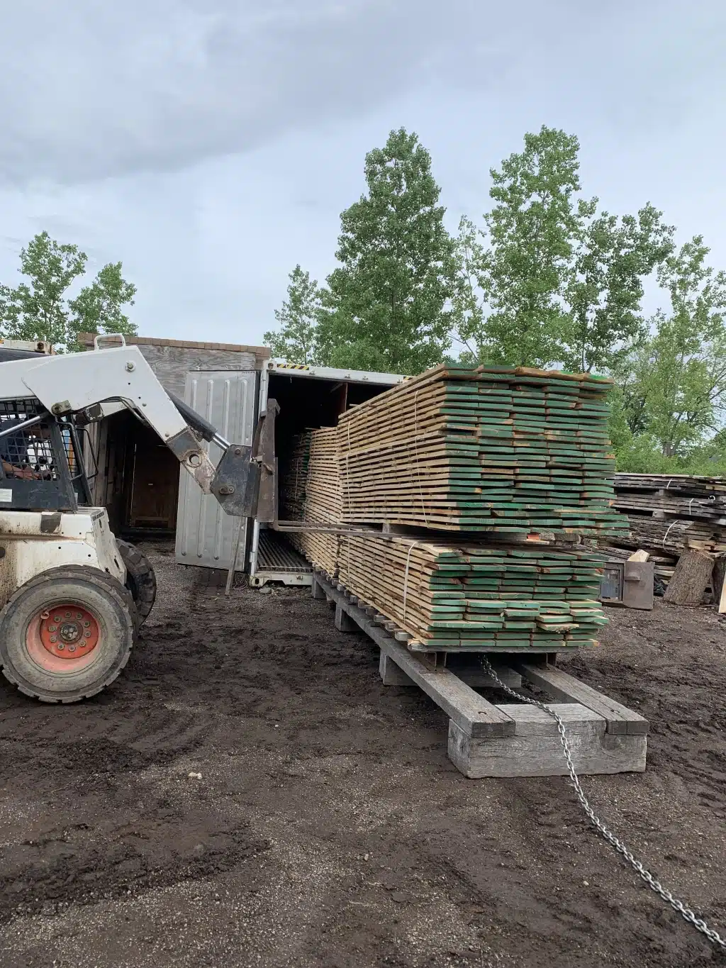 Wood loading a kiln.